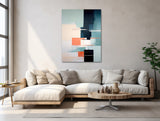 a living room with a white couch and a painting on the wall