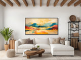 a living room with a white couch and a painting on the wall